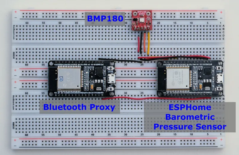 Two ESP32 modules, one loaded with the ESPHome Bluetooth Proxy image, one loaded loaded with ESPHome support for the BMP180 module